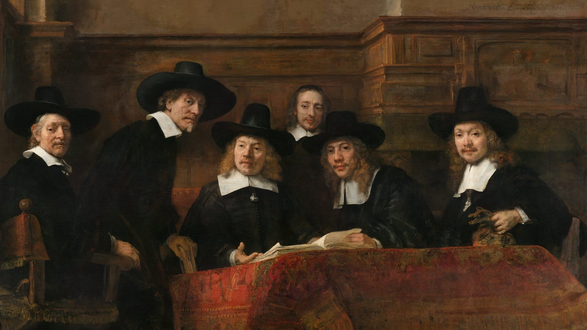 Rembrandt's Syndics of the Drapers' Guild, officials reviewing a book at a table, hero art for the Executives page
